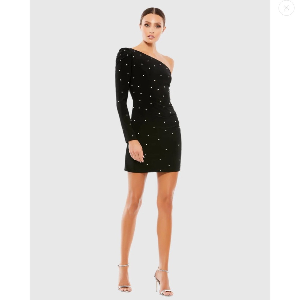 13. Ieena by Mac Duggal Rhinestone Encrusted One Shoulder Long Sleeve Mini Dress